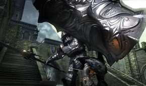 Fighting a gaint knight in Demon's Souls
