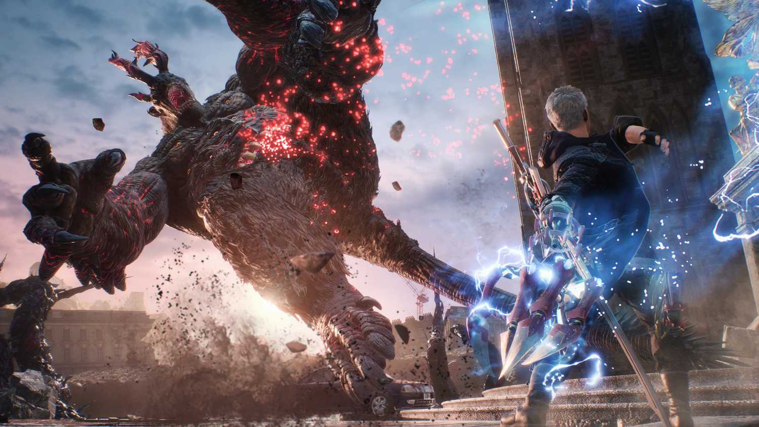 Nero fighting a giant demon in Devil May Cry 5 (2019).