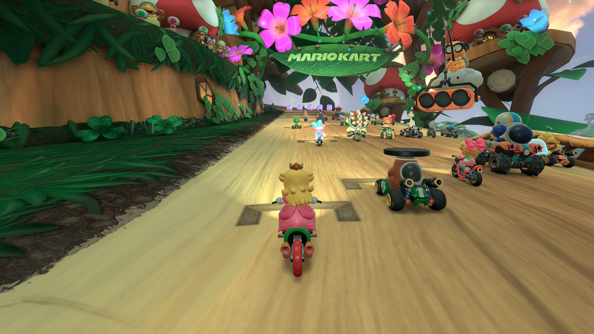 Mario Kart World Peach riding a pipe motorcycle