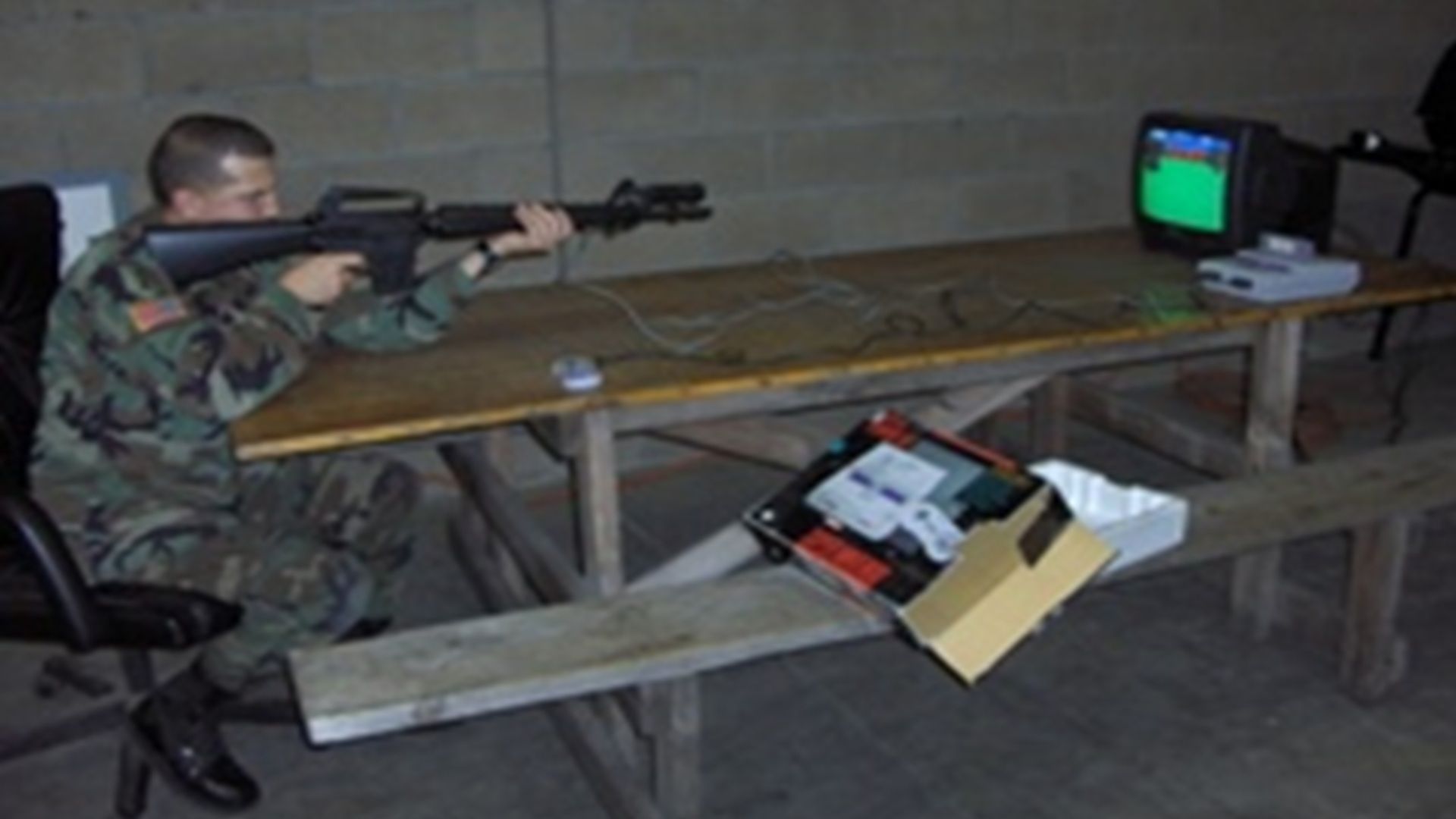 A shot of a soldier playing M.A.C.S. Moving Target Simulator