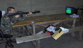 A shot of a soldier playing M.A.C.S. Moving Target Simulator