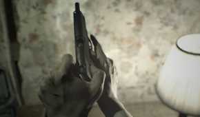 Ethan cocking a pistol in Resident Evil 7 (2017).