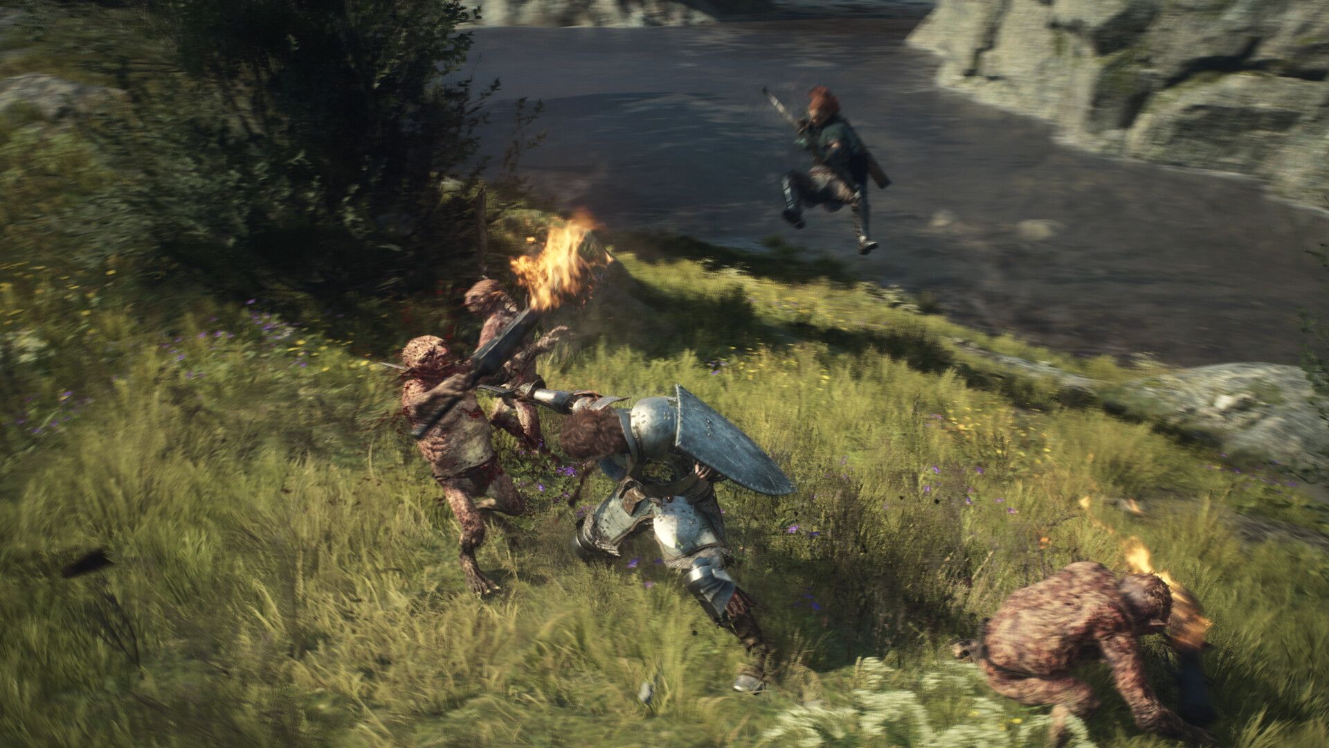 A knight killing goblins