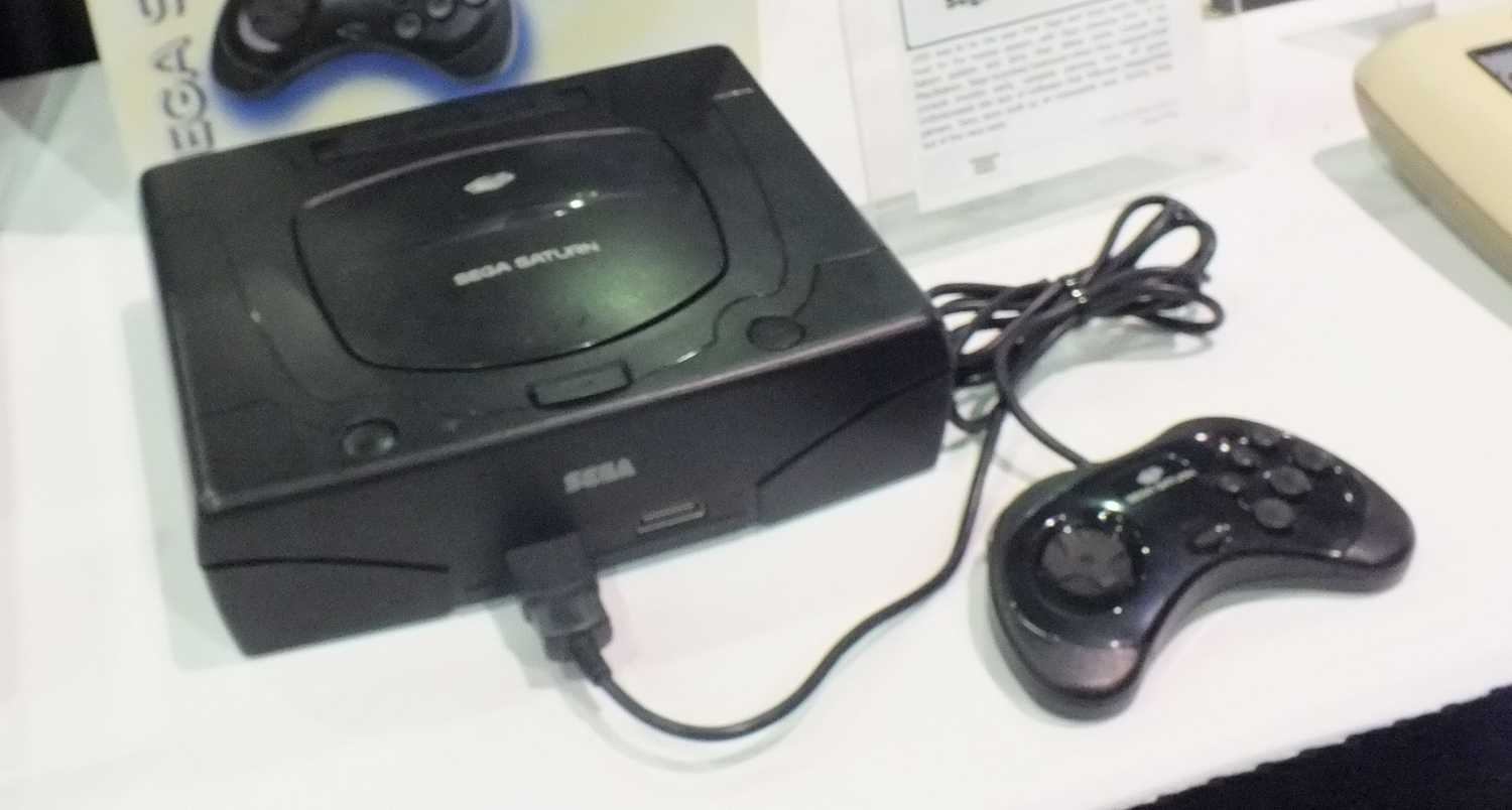 Sega Saturn console with controller.
