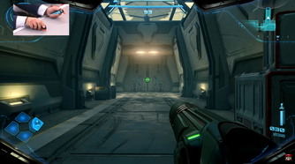 Screenshot of Metroid Prime 4 Beyond with a small view of the player suing one of the Joy-Con 2 as a mouse