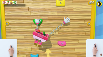 Screenshot of Super Mario Party Jamboree Nintendo Switch 2 Edition during a rock-climbing minigame with a small view of the player suing one of the Joy-Con 2 as a mouse
