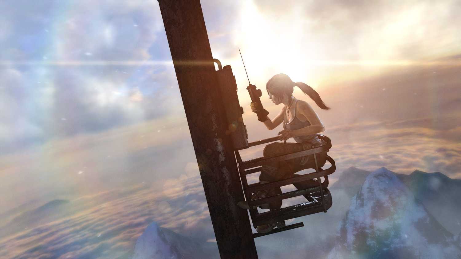 Lara Croft high up on a radio tower in 2013's Tomb Raider.