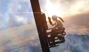 Lara Croft high up on a radio tower in 2013's Tomb Raider.