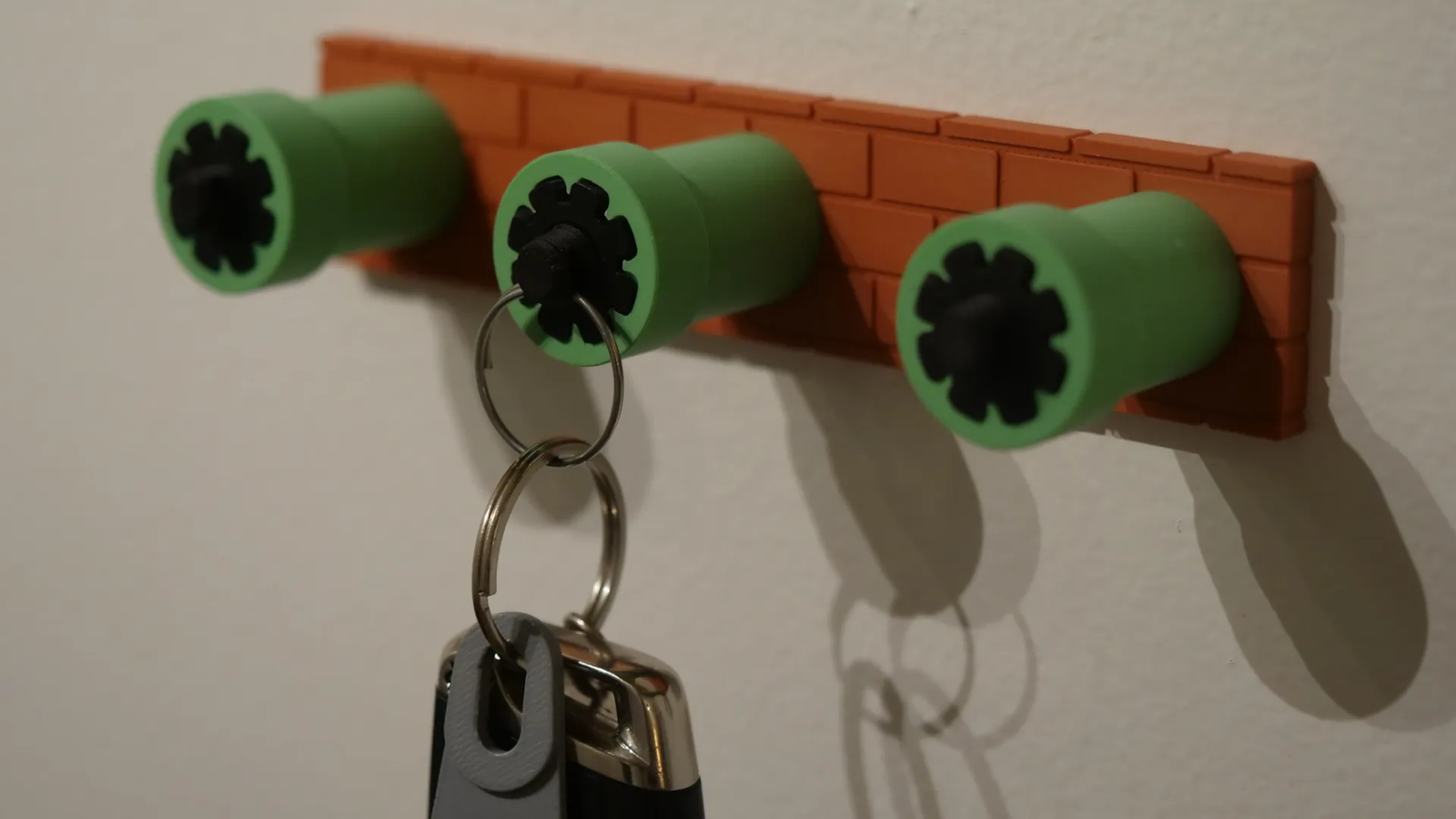 I'm in love with this 3D-printable Mario-themed key holder, and I think ...