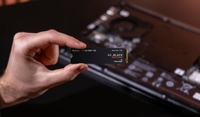 person holding WD_BLACK SN7100 NVMe Internal Gaming SSD