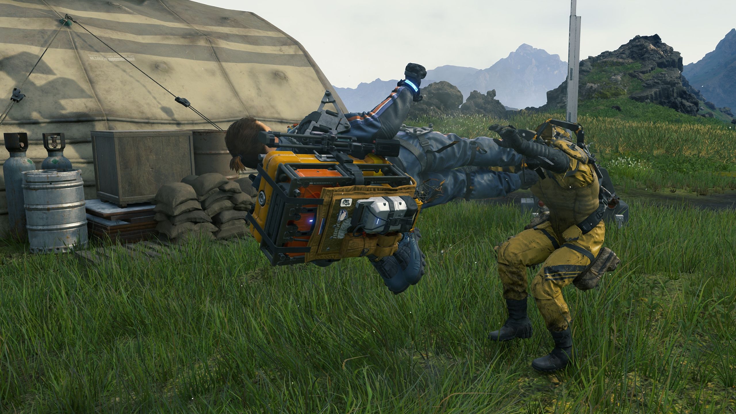 Sam drop-kicking an enemy in Death Stranding: Director's Cut.