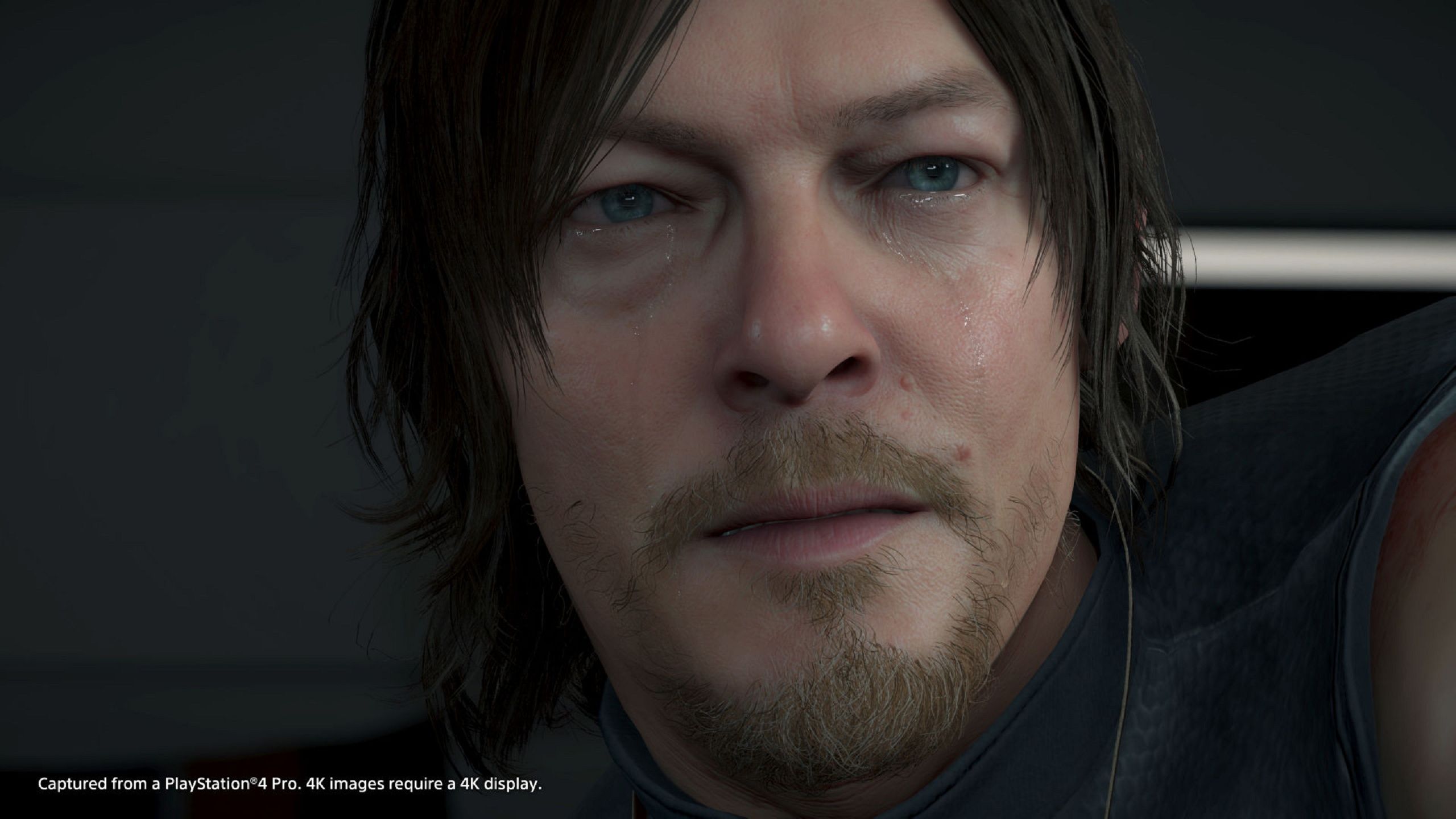 Norman Reedus as Sam in Death Stranding, crying.