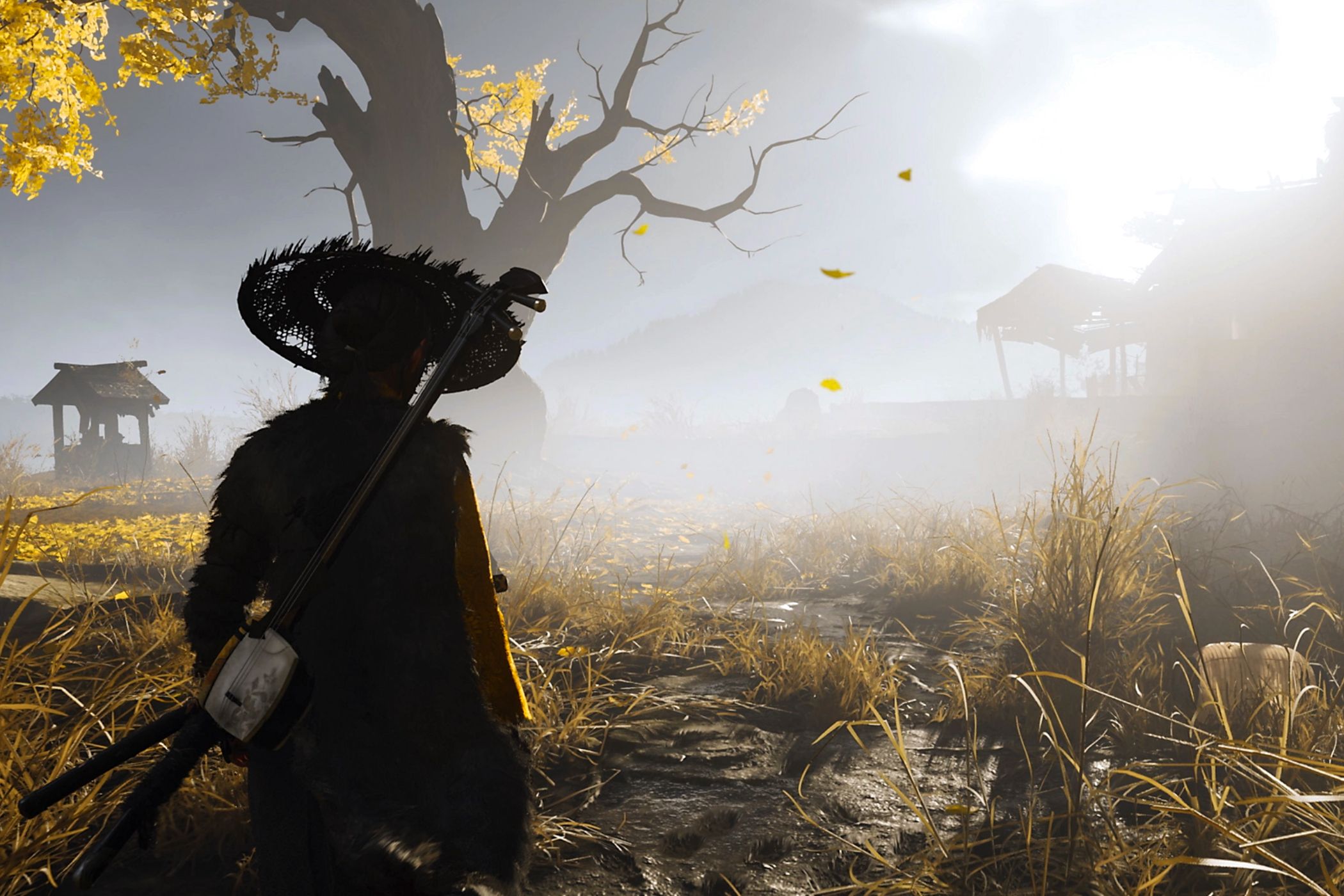 A screenshot from Ghost of Yotei, showing Atsu sitting in a ruined village.