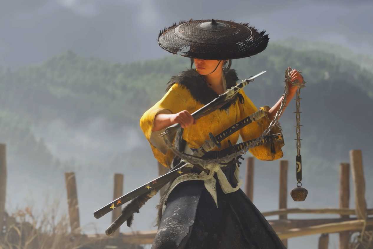 A screenshot from Ghost of Yotei, showing Atsu holding a Kusarigama.