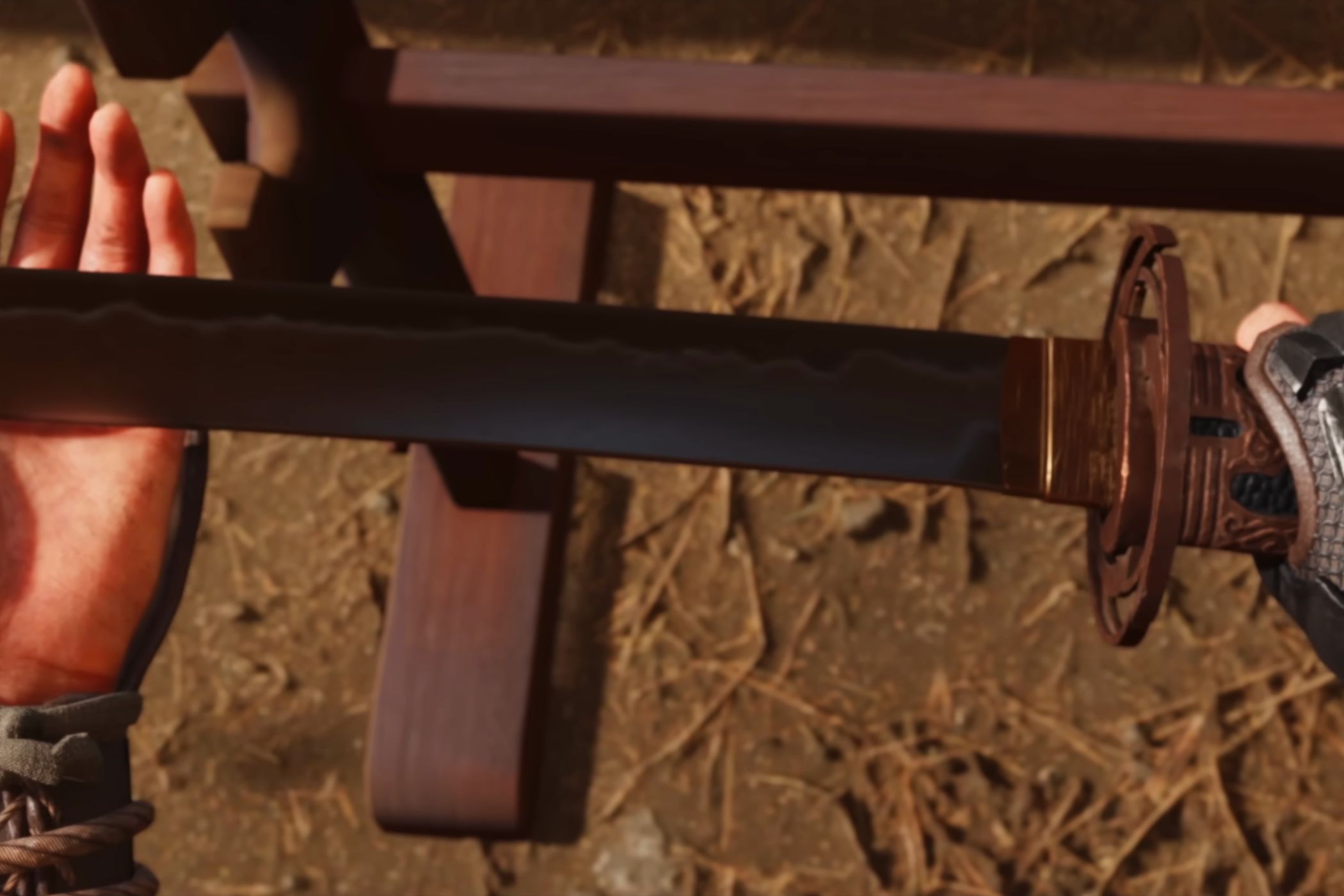 A screenshot from Ghost of Yotei, showing Atsu holding a katana.