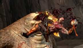 A screenshot of Kratos fighting a cyclops in God of War III