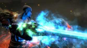 A screenshot of Kratos using a sword on a titan in God of War III