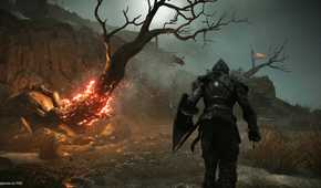 A flaming tree in the rain in Demon's Souls.