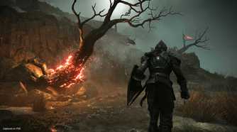 A flaming tree in the rain in Demon's Souls.