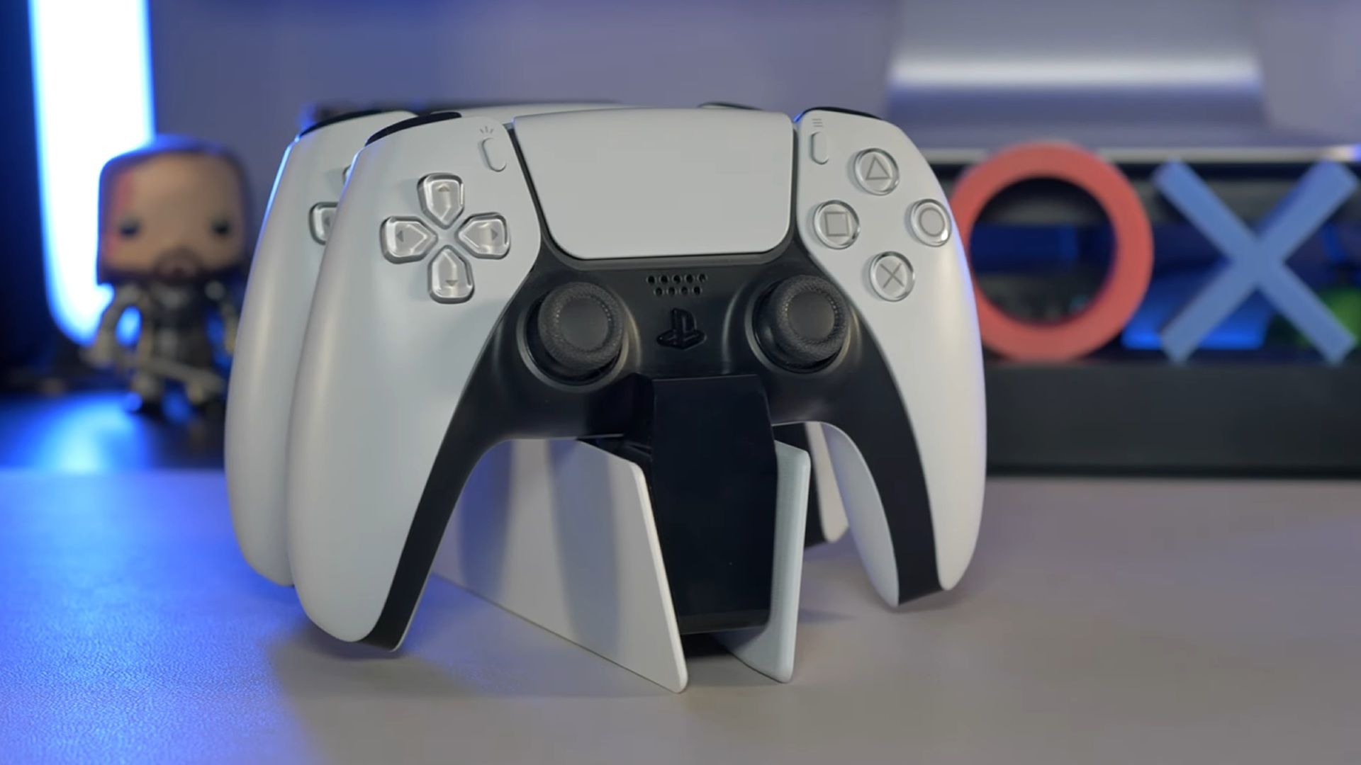 A shot of the official PlayStation 5 DuelSense Charging station with two controllers