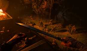 The player facing a horde of infected at night next to a burning vehicle in Dying Light: The Beast.