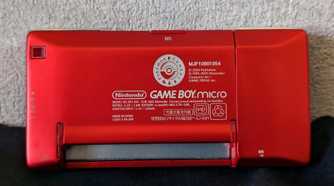 The backside of a red Game Boy Micro from the Japan Pokemon Center.