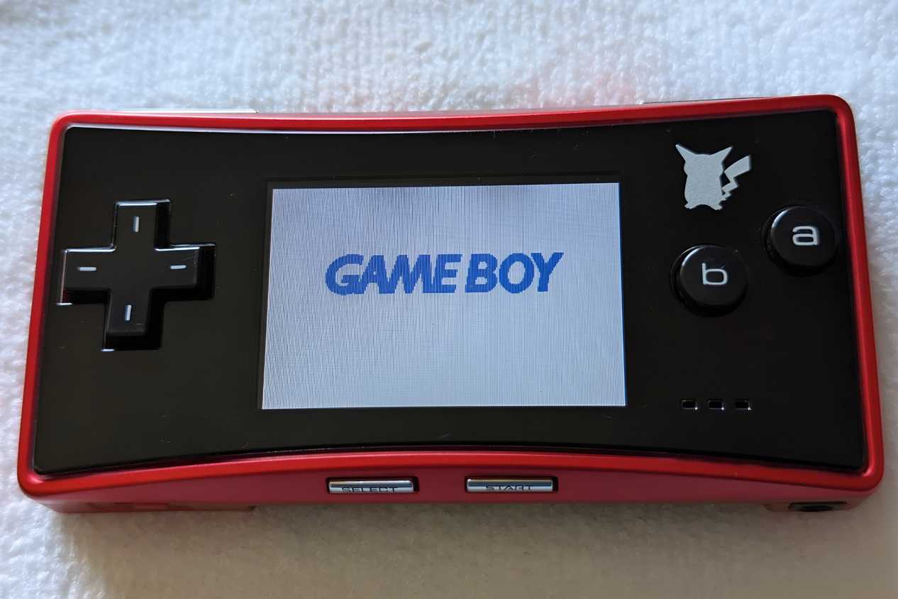 A red Game Boy Micro from the Japan Pokemon Center.