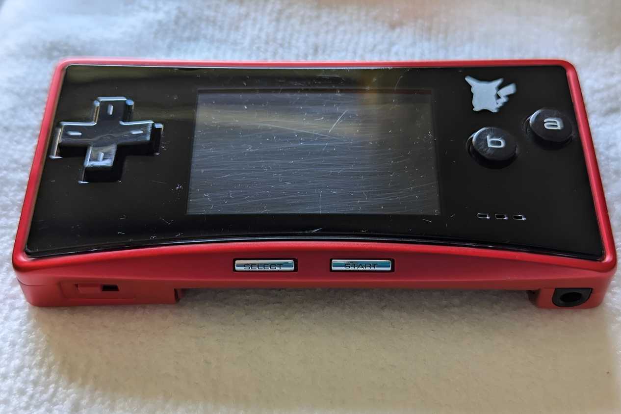 A red Game Boy Micro from the Japan Pokemon Center.