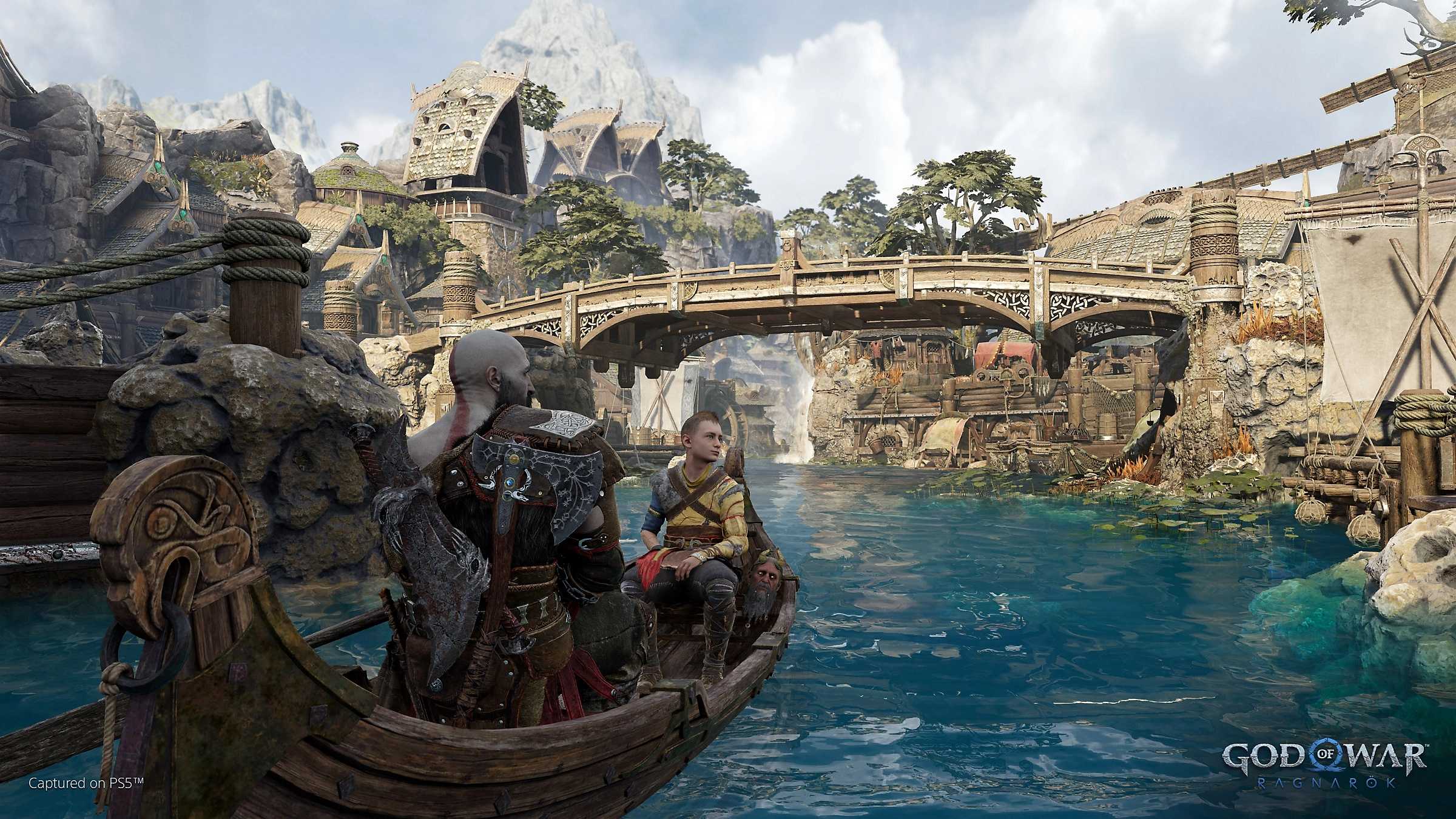Kratos and Atreus in Svartalfheim in God of War Ragnarok.