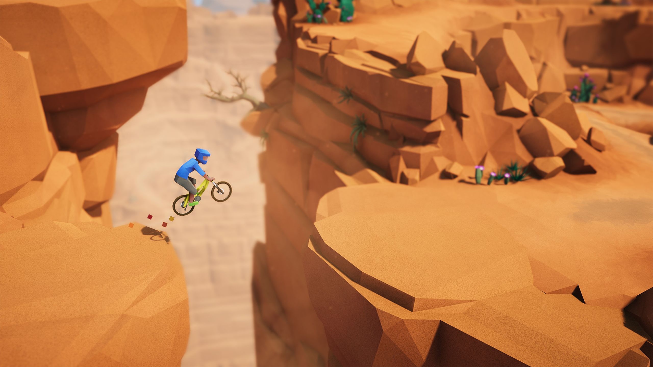 Jumping over a gap in the canyon in Lonely Mountains: Downhill.