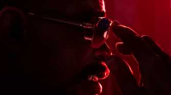 Blade adjusting his sunglasses in the trailer for Marvel's Blade game.