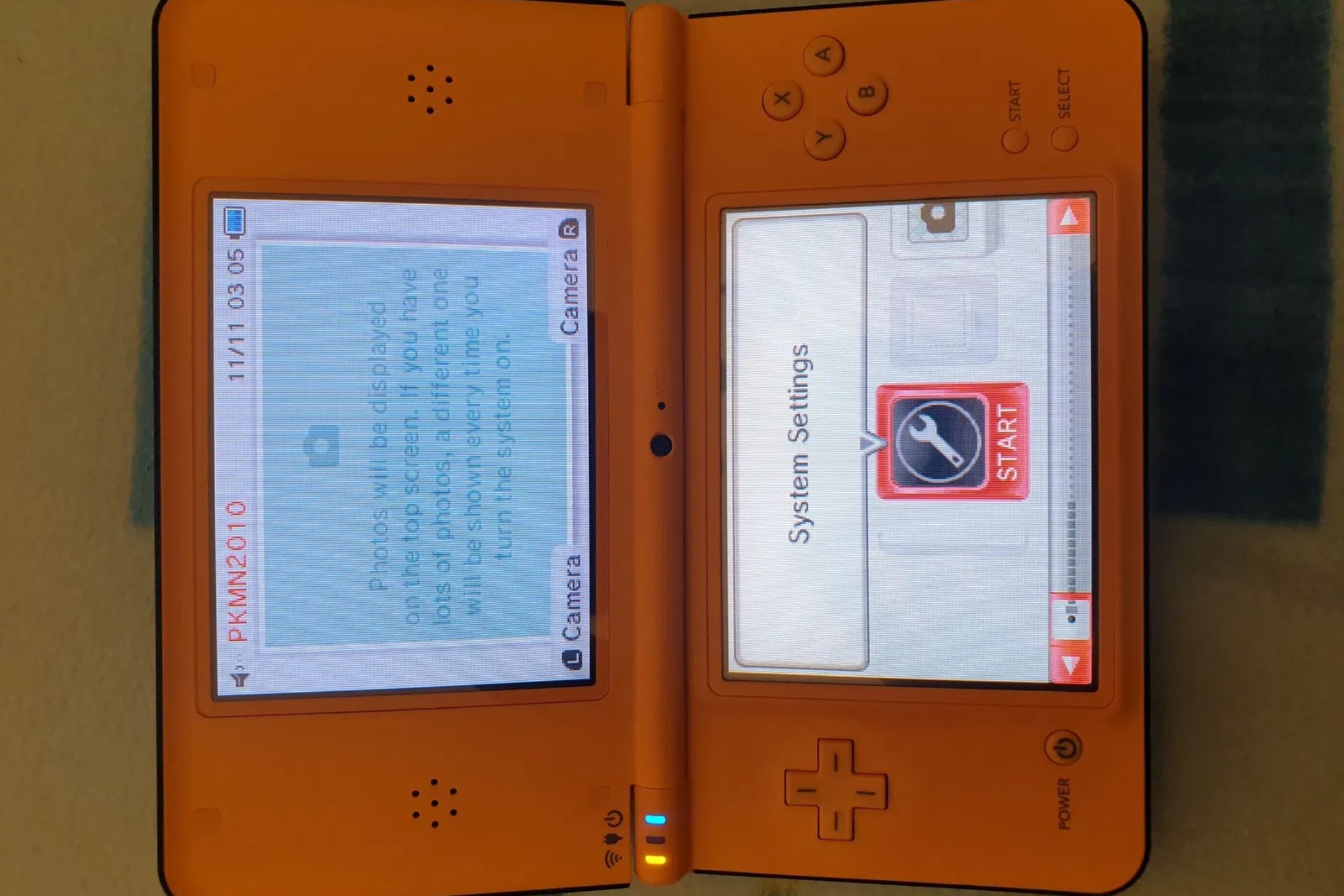 An open Nintendo DSi XL from the 2010 Pokemon World Championships.