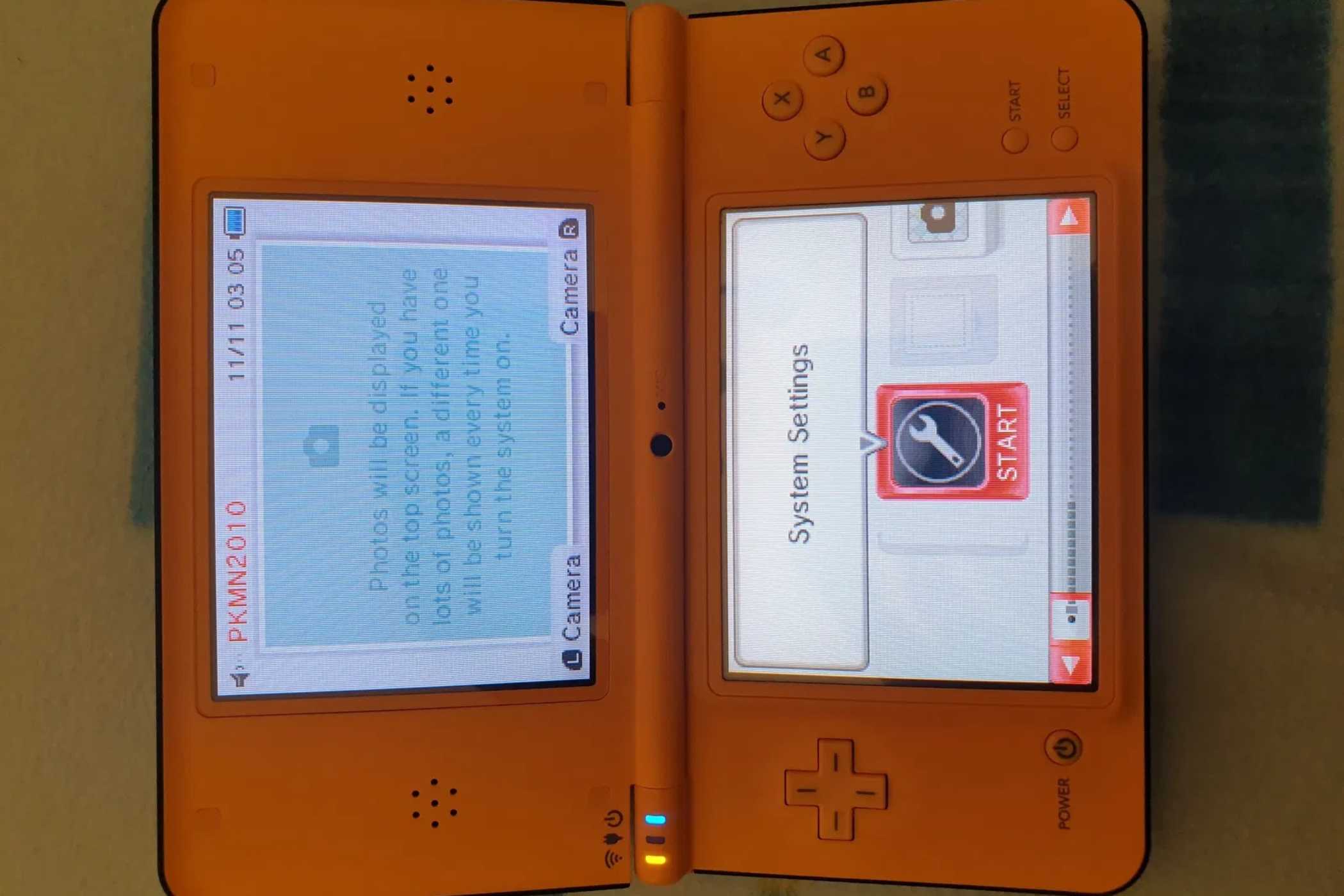 An open Nintendo DSi XL from the 2010 Pokemon World Championships.