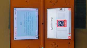 An open Nintendo DSi XL from the 2010 Pokemon World Championships.