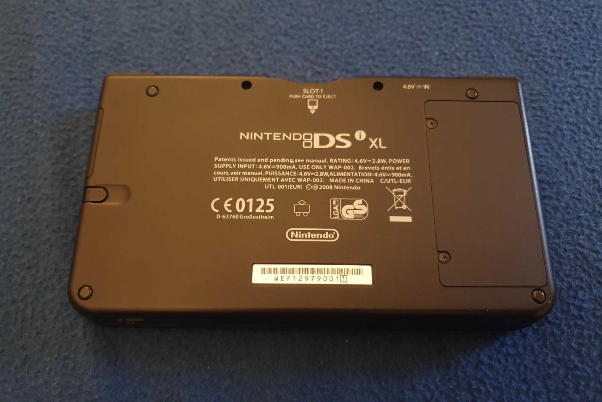 The backside of a Nintendo DSi XL from the 2010 Pokemon World Championships.