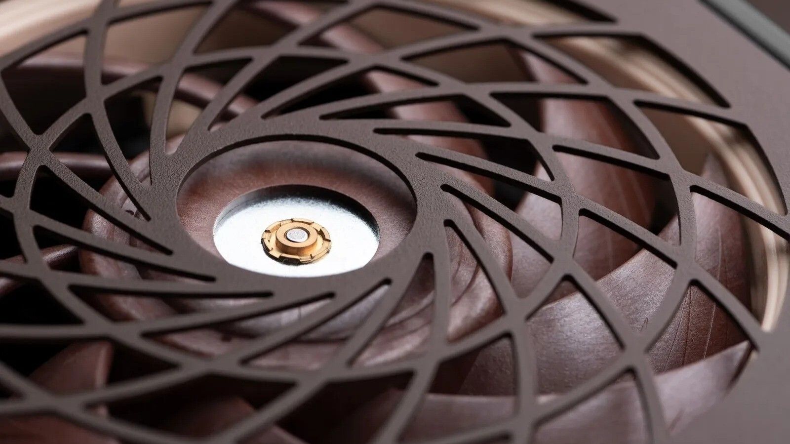 A brown Noctua fan with a matching brown plastic grille on it