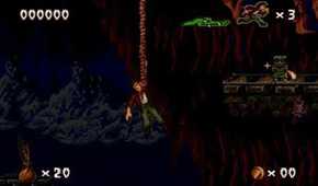 A screenshot of Harry dangling from a rope in Pitfall: The Mayan Adventure