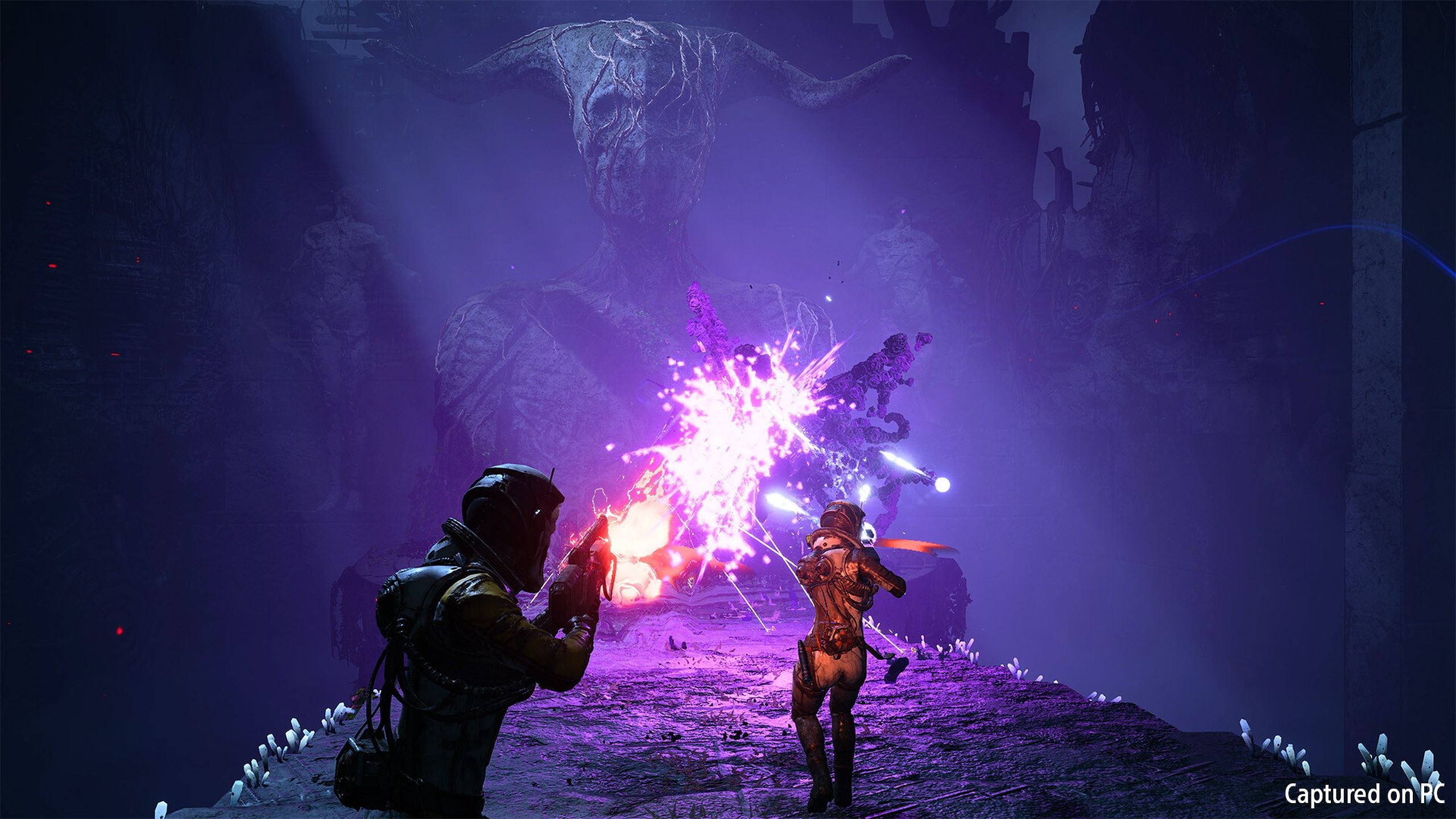 A screenshot of co-op gameplay in Returnal.