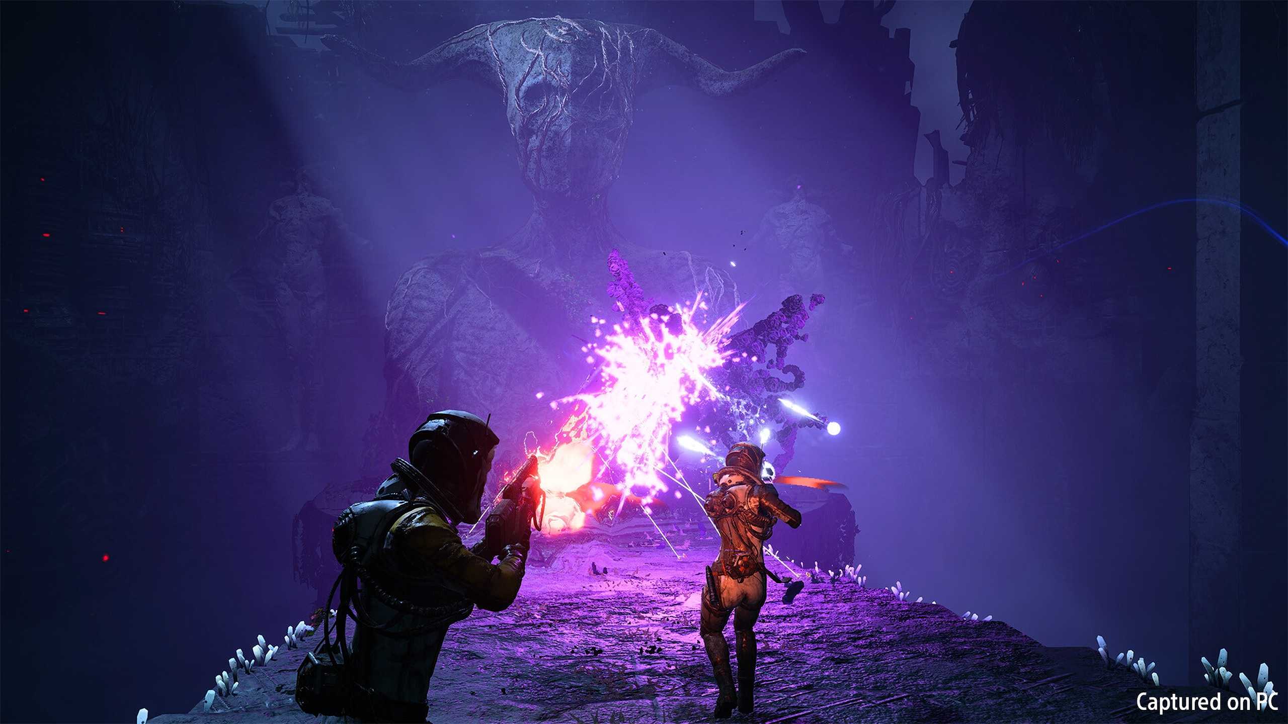 A screenshot of co-op gameplay in Returnal.