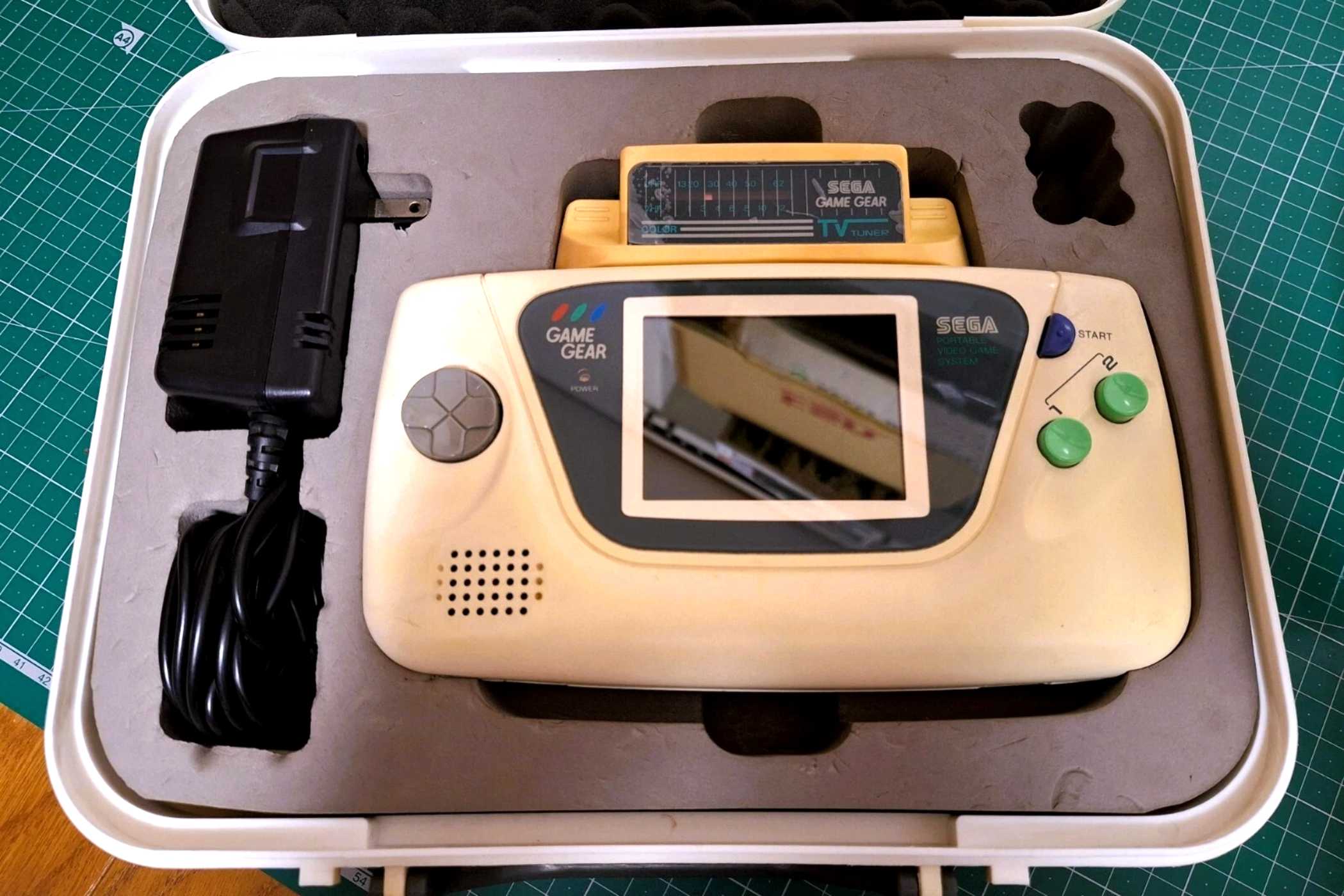 The rare white Sega Game Gear in its case.