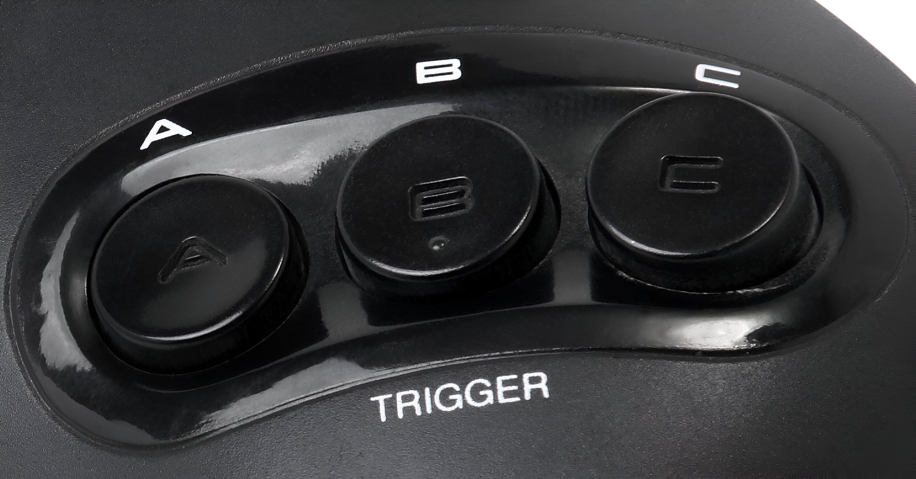 Face buttons on a Sega Genesis controller.