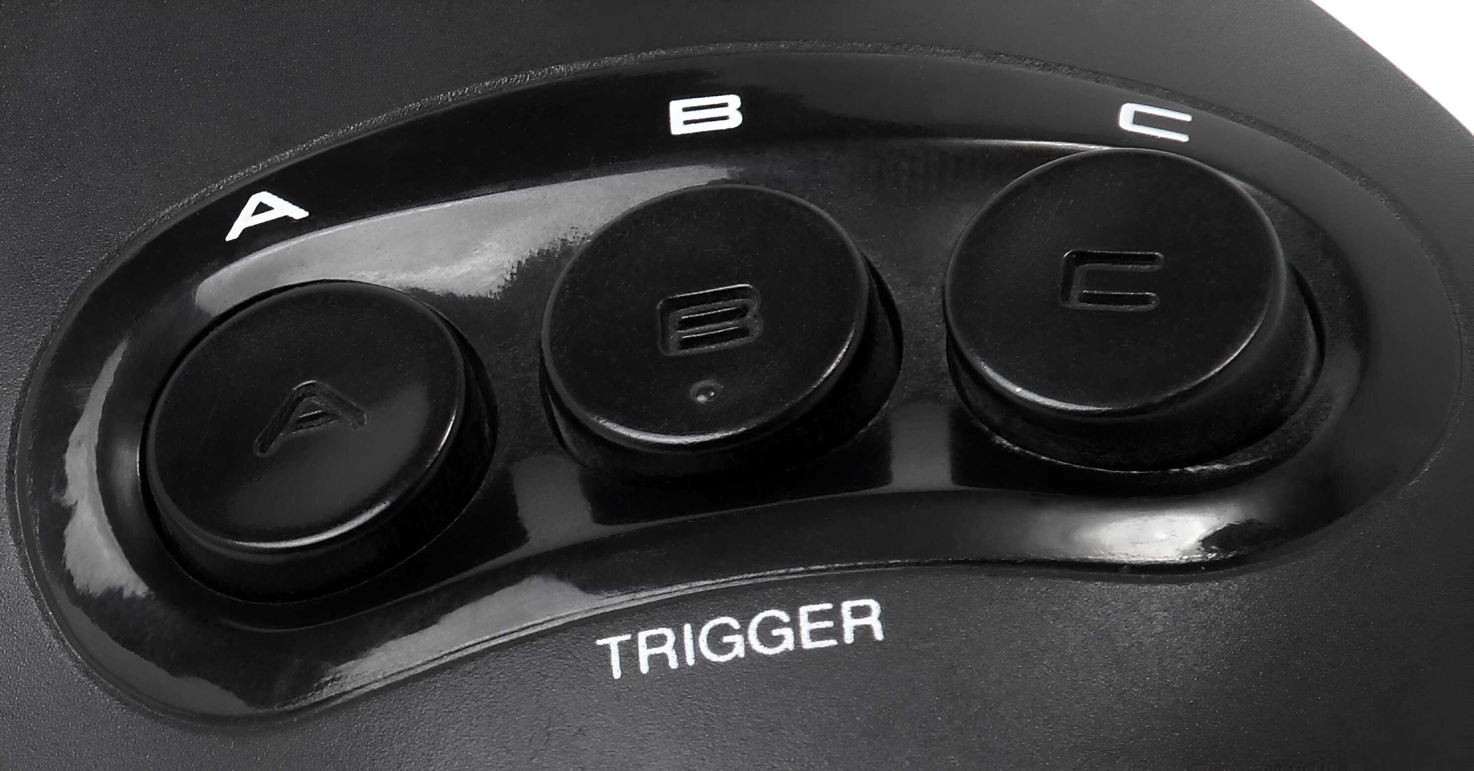 Face buttons on a Sega Genesis controller.
