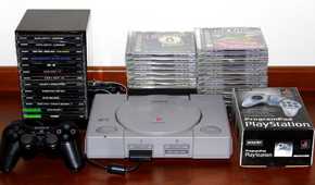 Sony PlayStation 1 with games and a controller.