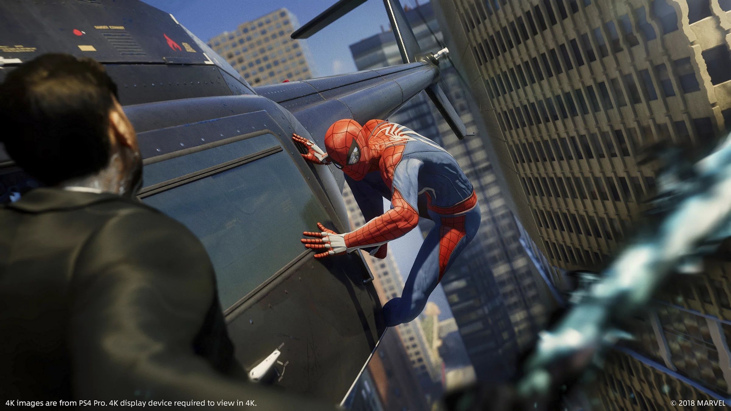 Spider-Man sticking to the side of a helicopter in Spider-Man 2018.