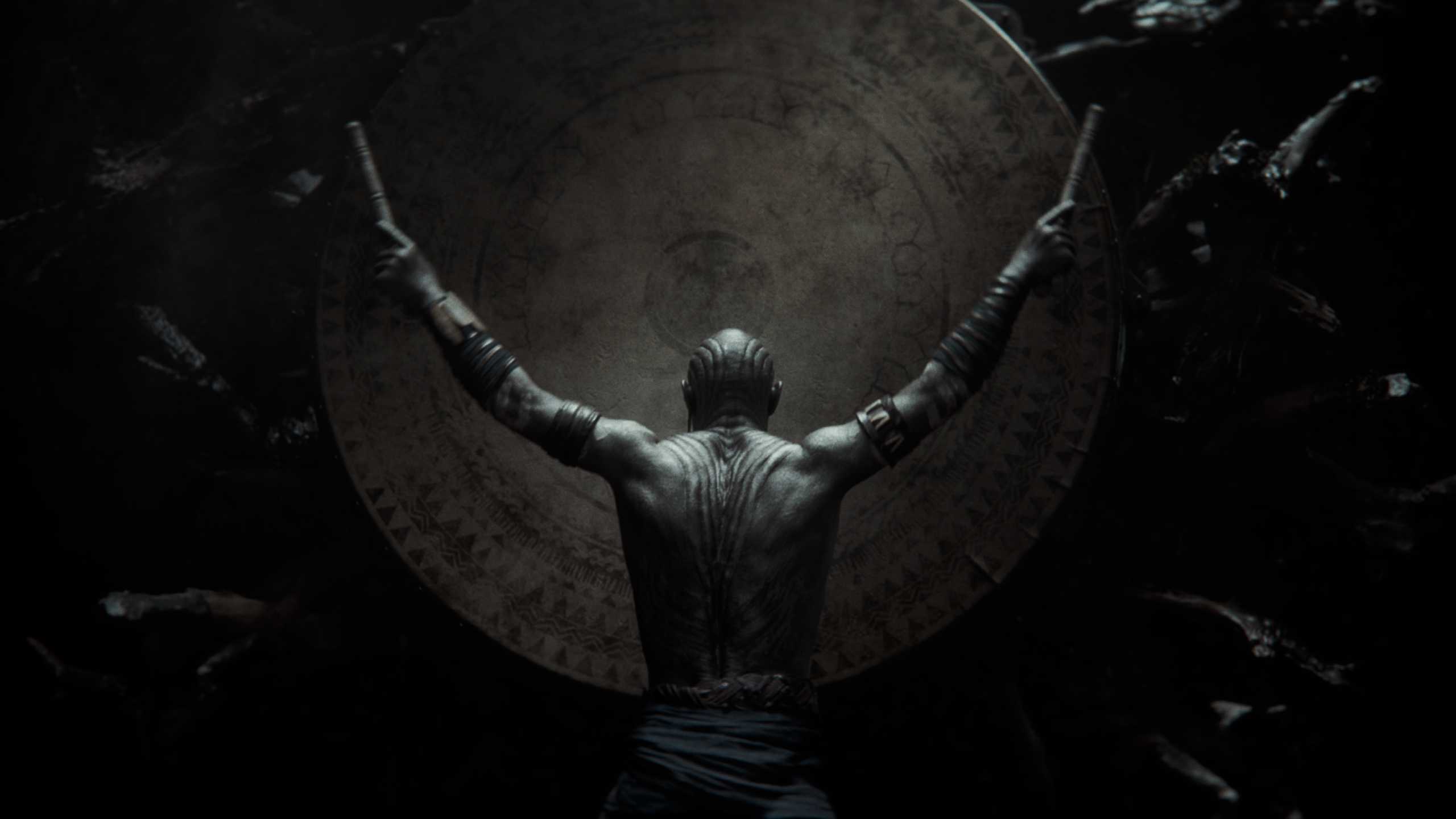 A man banging a drum wedged in between tree roots in Star Wars Eclipse.
