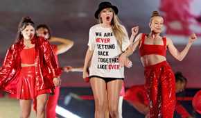 A shot of Taylor Swift during the 22 performance during The Eras Tour