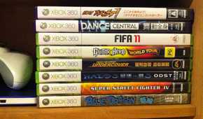 Disc version of Xbox 360 games stacked.