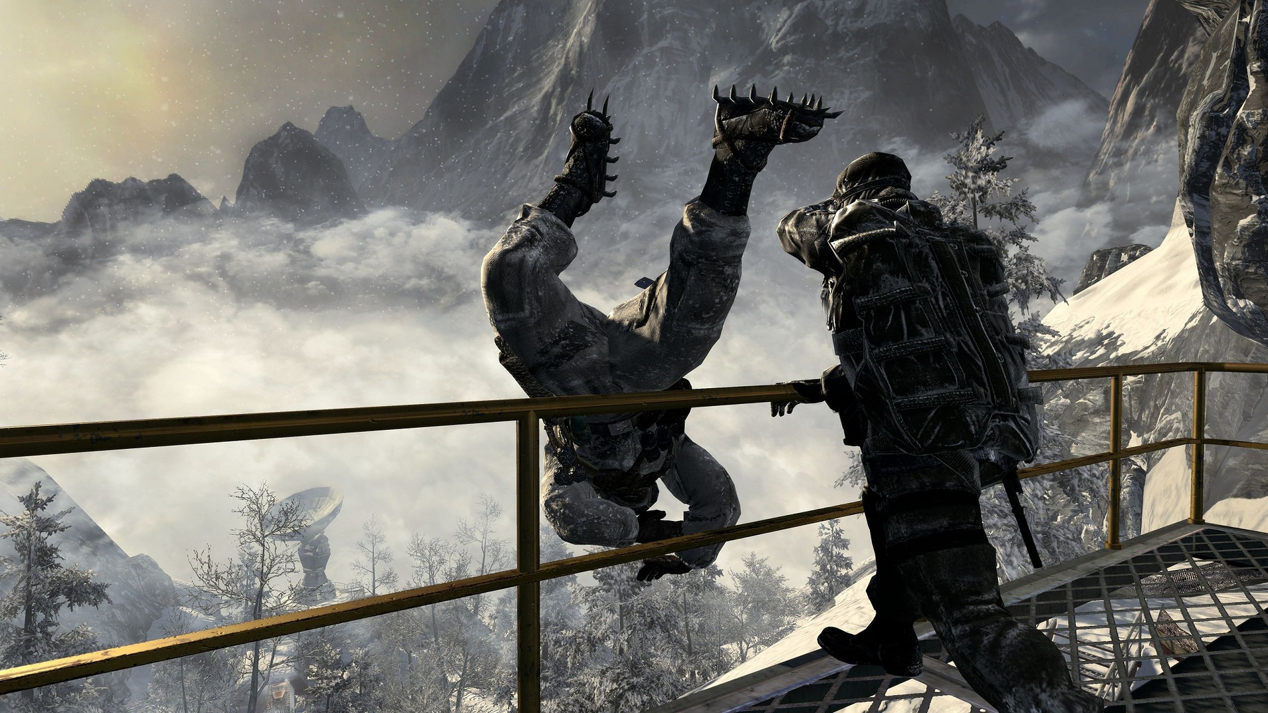 A person throwing a guard off a high railing in Call of Duty: Black Ops.