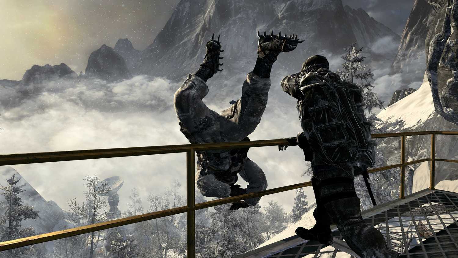 A person throwing a guard off a high railing in Call of Duty: Black Ops.