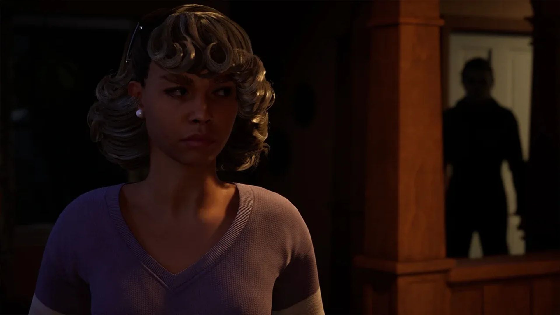 A screenshot of Michael Meyers stalking a victim in Halloween